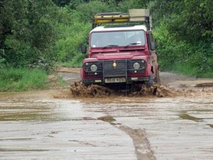 4WDing through river crossings while game driving in East Africa