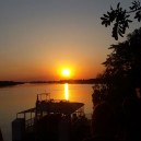 After a day of exploring Victoria Falls, walking with lions and discovering the town of Livingstone, sit back and relax on a magical sunset cruise along the Zambezi River.