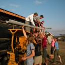 Hands on is what all our community service trips are about, here students installed gutters and water tanks to bring clean water to a poor farmer in Kenya
