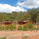 We will see and experience so many things on our budget safari to Africa including passing a number of traditional villages like this one in Tanzania
